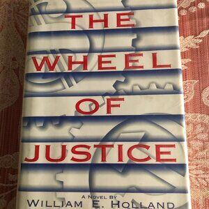 William E Holland, the wheel of justice hard cover first edition book